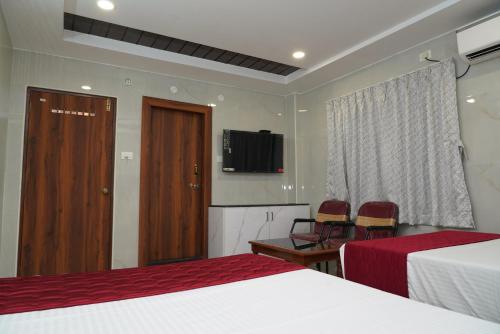 Gallery image of HOTEL THANVI iNN in Guntūr