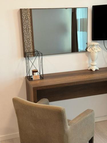 TV a/nebo společenská místnost v ubytování Uniluxury Hotel Prishtina
