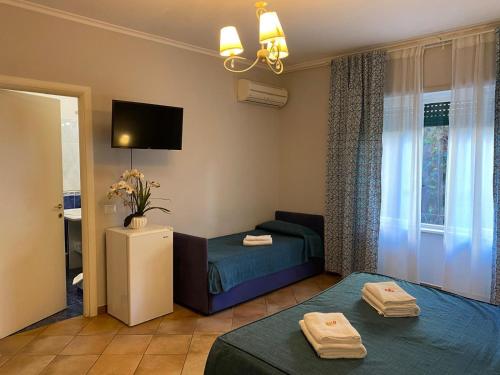A bed or beds in a room at Domus Prati