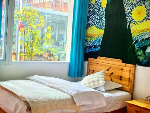 Katil atau katil-katil dalam bilik di Shangri-La Chudengshuo Homestay楚登硕民宿