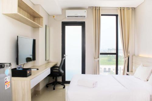 Katil atau katil-katil dalam bilik di Comfortable Studio at Monroe Tower Apartment By Travelio
