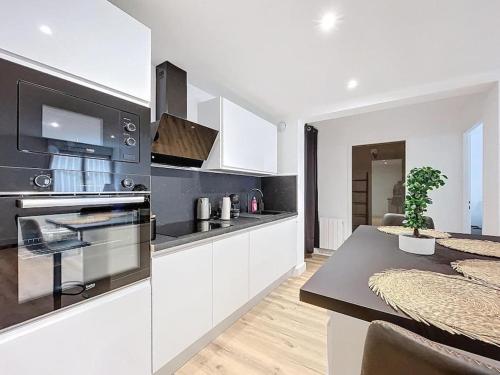 Køkken eller tekøkken på Escapade confortable et chic parking et vélo-box