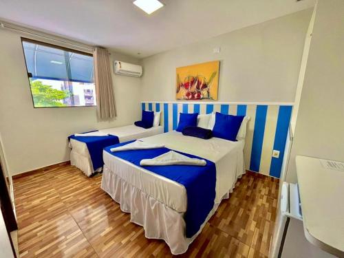 Suites Tropicalにあるベッド