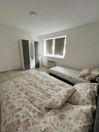 Postel nebo postele na pokoji v ubytování Rosa Canina Kupres 2 - Centar