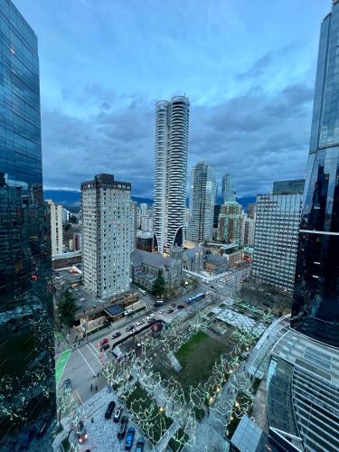 a view of a city with tall buildings at City Retreat With Views in the Heart of Downtown in Vancouver