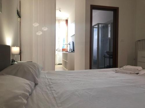 Ένα ή περισσότερα κρεβάτια σε δωμάτιο στο Residence Porta Saragozza