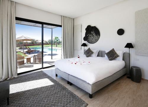 Postel nebo postele na pokoji v ubytování Villa Sbaa Marrakech