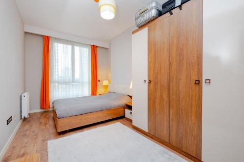 Postel nebo postele na pokoji v ubytování Lux Residence 1 room 1 saloon