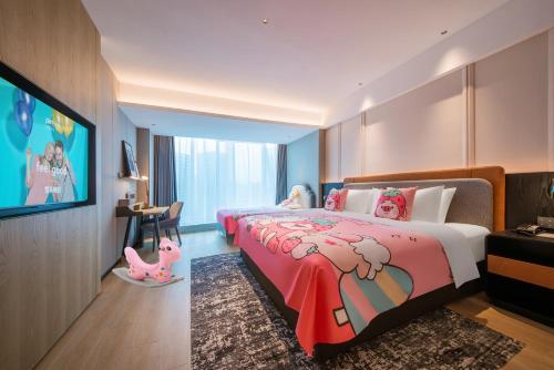 Katil atau katil-katil dalam bilik di Park Inn by Radisson Hangzhou Fuyang Wildlife
