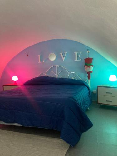 A bed or beds in a room at CIRO'S HOUSE