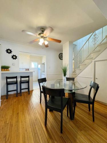 a dining room and kitchen with a table and chairs at Bargain Beverly Hills 3 Bedroom in great area 5 minutes to Rodeo Drive in Los Angeles