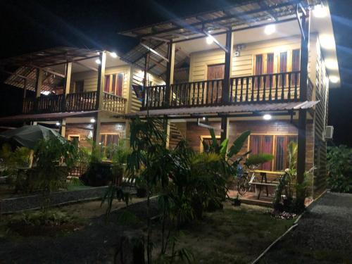 a house at night with its lights on at Mountain View House Kampot in Kampot