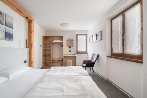 Ένα ή περισσότερα κρεβάτια σε δωμάτιο στο Residence Alessio