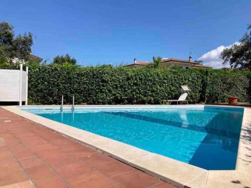 Bazén v ubytování Villa Eleonora con piscina privata a Sabaudia nebo v jeho okolí