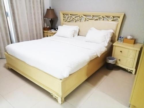 เตียงในห้องที่ Altoot homes