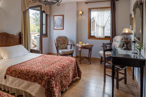 Postel nebo postele na pokoji v ubytování Hotel Rústico Fonteverde