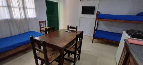 Ένα ή περισσότερα κρεβάτια σε δωμάτιο στο Cabañas Lo de Luis