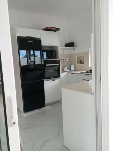 Η κουζίνα ή μικρή κουζίνα στο Cosy house with pool