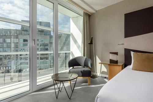 En eller flere senge i et værelse på Room Mate Aitana, Amsterdam