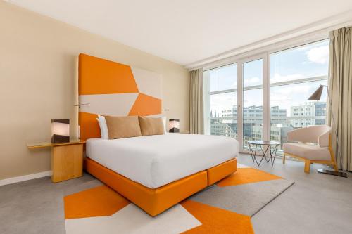 En eller flere senge i et værelse på Room Mate Aitana, Amsterdam