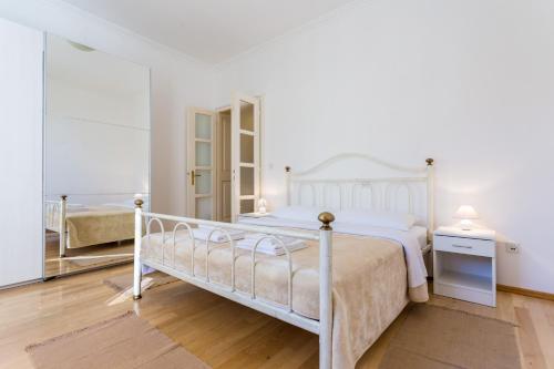 Кровать или кровати в номере Apartment Thalassicus A27