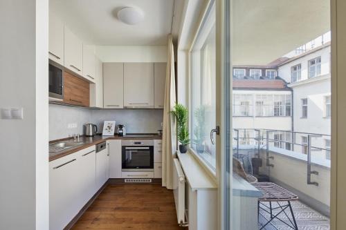 Kuchyň nebo kuchyňský kout v ubytování Prague Days - Deluxe Apartments near Wenceslas Square