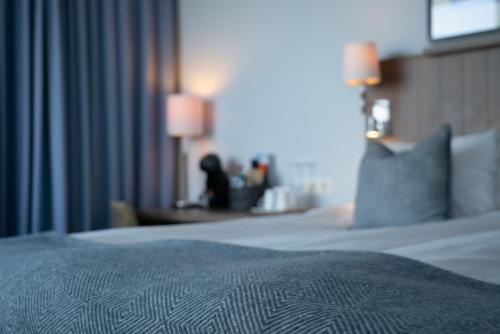 a close up of a bed in a hotel room at Marstrands Havshotell in Marstrand