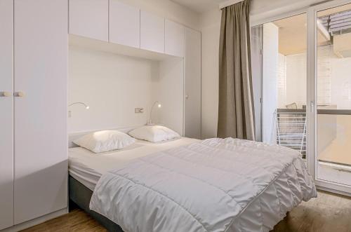 Postel nebo postele na pokoji v ubytování Gray Dalbion A53 G