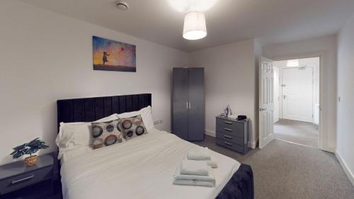Ένα ή περισσότερα κρεβάτια σε δωμάτιο στο One and Two Bed Apartments Slough near Heathrow