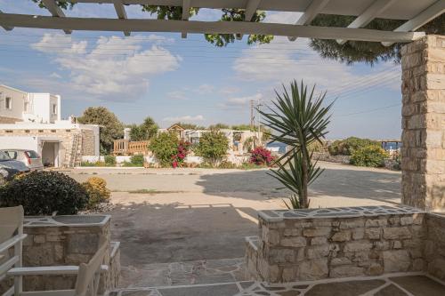 a view of a parking lot with a potted plant at Christiana Hotel in Ambelas