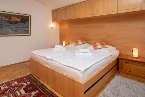 Katil atau katil-katil dalam bilik di Ferienhaus Zauberberg - Magie der Alpen - by Loewenherz