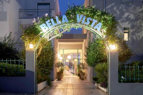 an entrance to a building with a sign that reads chillwell at Bella Vista Hotel "by Checkin" in Hersonissos