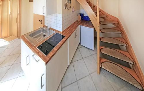 Köök või kööginurk majutusasutuses Ferienhaus Ribnitz-Damgarten