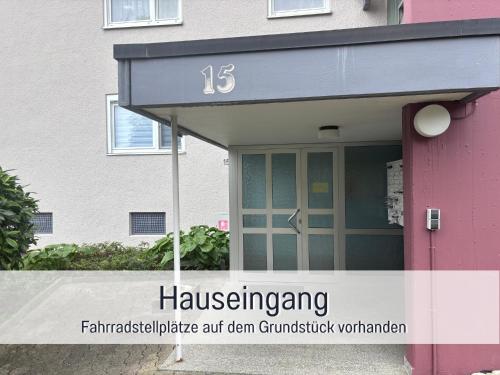a building with a house with the number at Casa Michaela Öhringen - wunderschöne Aussicht - Top für Familien und Geschäftsreisen, super ausgestattet in Öhringen
