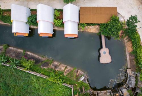 an aerial view of a pond with a paddle at King Bavi Resort in Ba Vì