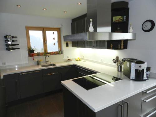 a kitchen with a sink and a counter top at Apartment Panorama- Chalet by Interhome in Blankenburg