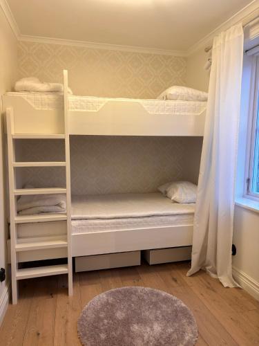 Katil atau katil-katil dalam bilik di Hagneryd Gård B&B