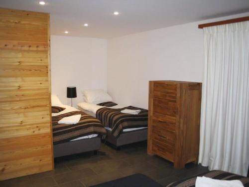 Apartment Nubes- Chalet by Interhomeにあるベッド