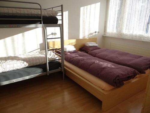 Postel nebo postele na pokoji v ubytování Apartment Neuschwändi 66 by Interhome