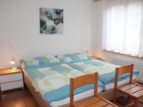 Katil atau katil-katil dalam bilik di Apartment Aegertenstrasse 10 by Interhome