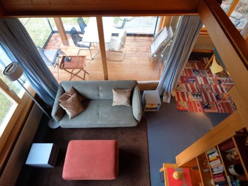 an overhead view of a living room with a couch at Apartment Weidli- Chalet by Interhome in Zweisimmen