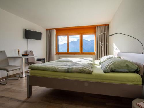 Ένα ή περισσότερα κρεβάτια σε δωμάτιο στο Apartment Zurschmitten 8 2- UG Süd by Interhome