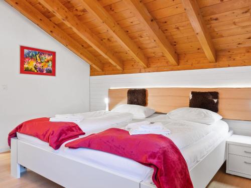 Ένα ή περισσότερα κρεβάτια σε δωμάτιο στο Apartment Aragon P36 by Interhome