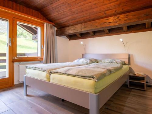 Katil atau katil-katil dalam bilik di Apartment Zurschmitten 17 1- OG Süd by Interhome