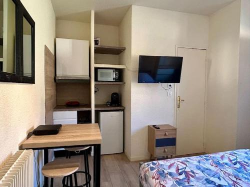 Kuchyň nebo kuchyňský kout v ubytování Lion d'or 25 - Chambre meublée et équipée - centre-ville