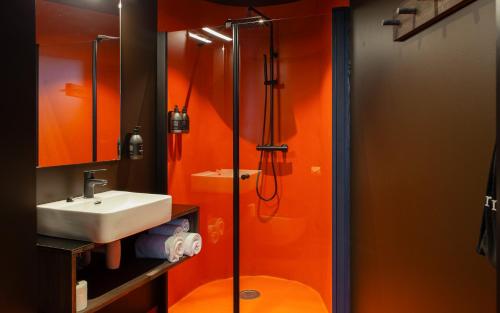 Salle de bains dans l'établissement Elva Hotel