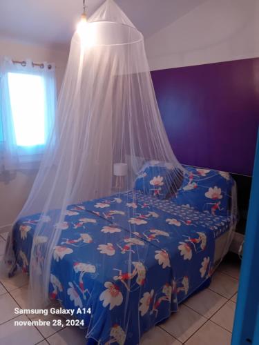 Postel nebo postele na pokoji v ubytování gîte La Cannaie