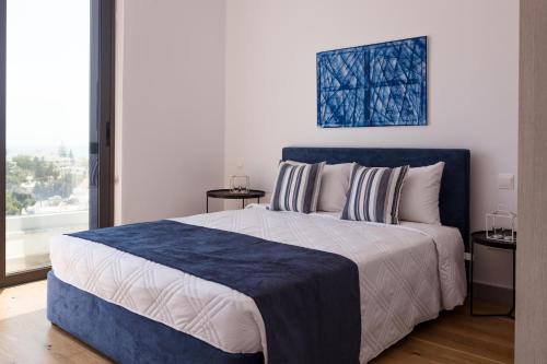 En eller flere senge i et værelse på Arcadia 2 101 2 BED