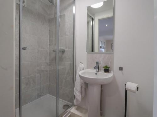 a bathroom with a sink and a shower at Providence Court in York