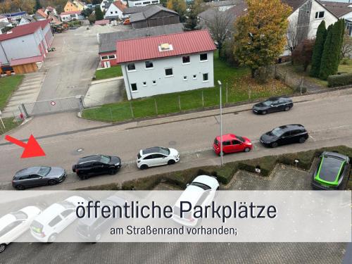 an overhead view of a parking lot with cars parked at Casa Michaela Öhringen - wunderschöne Aussicht - Top für Familien und Geschäftsreisen, super ausgestattet in Öhringen